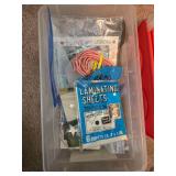 Assorted Office and School Supplies Collection with Scissors, Pens, Laminating Sheets, and Awards
