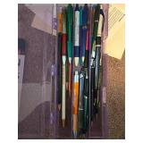 Assorted Office and School Supplies Collection with Scissors, Pens, Laminating Sheets, and Awards