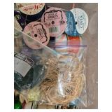 Collection of Gift Wrap Supplies with Rolls, Bows, Ribbons, and Decorative Pieces