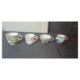 Vintage Assorted Decorative Porcelain Cups, Saucers, Bell, and Commemorative Plate Collection