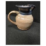Vintage handmade glazed stoneware pitcher