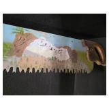 53" Hand Saw with Mt. Rushmore mural painted on it.