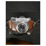 Collection of vintage cameras and accessories