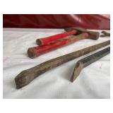 Two Hammers and Two Pry Bars with Red Handles and Rust Patina Two Hammers and Two Pry Bars with Red Handles and Rust Patina