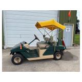 Cushman Golfster Electric Golf Cart with Yellow Canopy Cushman Golfster Electric Golf Cart with Yellow Canopy