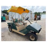 Cushman Golfster Electric Golf Cart with Yellow Canopy Cushman Golfster Electric Golf Cart with Yellow Canopy