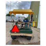 Cushman Golfster Electric Golf Cart with Yellow Canopy Cushman Golfster Electric Golf Cart with Yellow Canopy