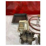 Automotive Parts Including Carburetors, Flywheels, Radiator, and Steering Wheel Automotive Parts Including Carburetors, Flywheels, Radiator, and Steering Wheel