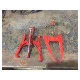 Two Red Heavy-Duty Gear Pullers Two Red Heavy-Duty Gear Pullers
