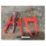 Two Red Heavy-Duty Gear Pullers Two Red Heavy-Duty Gear Pullers