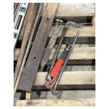 Assorted Levels, Pry Bars, and Pipe Assorted Levels, Pry Bars, and Pipe