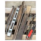 Assorted Levels, Pry Bars, and Pipe Assorted Levels, Pry Bars, and Pipe