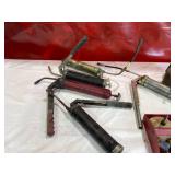 Grease Guns, Oil Can, and Assorted Hand Tools in Metal Toolbox Grease Guns, Oil Can, and Assorted Hand Tools in Metal Toolbox