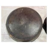 Four Assorted Cast Iron Skillets Including Wagner and Griswold Four Assorted Cast Iron Skillets Including Wagner and Griswold