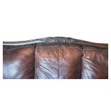 Elegant Leather Sofa with Carved Wood Accents