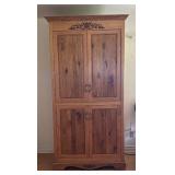 Vintage Wooden Armoire with Ornate Carvings