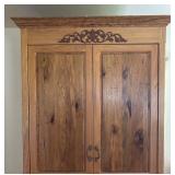 Vintage Wooden Armoire with Ornate Carvings