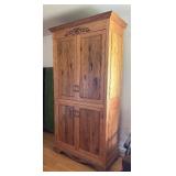 Vintage Wooden Armoire with Ornate Carvings
