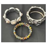 Set of 3 Assorted Fashion Bracelets Including Silver Tone, Shell, and Colorful Beaded Designs