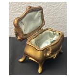 Vintage Gold-Tone Coffin Jewelry Box with Floral Design