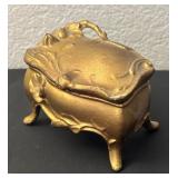 Vintage Gold-Tone Coffin Jewelry Box with Floral Design