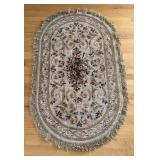Vintage Oval Area Rug with Floral Pattern and Fringe