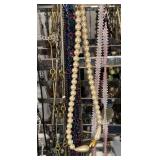 Large Group of Assorted Costume Necklaces with Stand
