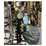 Large Group of Assorted Costume Necklaces with Stand