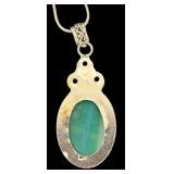 Sterling Silver 24 Inch Necklace with 2.5 Inch Turquoise Colored Agate and Red Gem Pendant