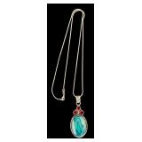 Sterling Silver 24 Inch Necklace with 2.5 Inch Turquoise Colored Agate and Red Gem Pendant