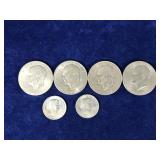 4 - Ike Eisenhower One Dollar Coins & 2 Susan B Anthony Coins - see description for more info 4 - Ike Eisenhower One Dollar Coins & 2 Susan B Anthony Coins - see description for more info