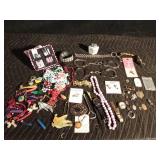 Lot of jewelry, lighter, handcuffs Lot of jewelry, lighter, handcuffs