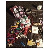 Lot of jewelry, lighter, handcuffs Lot of jewelry, lighter, handcuffs