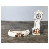 Small Collectible Figurines - Grandfather Clock and a Small Canoe that says city of London and British Manufactured Small Collectible Figurines - Grandfather Clock and a Small Canoe that says city of London and British Manufactured