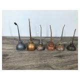 6 Small Collectible Thumb Press Oil Cans 6 Small Collectible Thumb Press Oil Cans