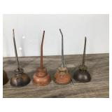 6 Small Collectible Thumb Press Oil Cans 6 Small Collectible Thumb Press Oil Cans