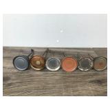 6 Small Collectible Thumb Press Oil Cans 6 Small Collectible Thumb Press Oil Cans