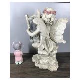 Little Girl Praying and a Fairy with Wind Chimes Little Girl Praying and a Fairy with Wind Chimes
