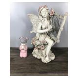 Little Girl Praying and a Fairy with Wind Chimes Little Girl Praying and a Fairy with Wind Chimes