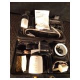 Electric airless paint sprayer in case Electric airless paint sprayer in case
