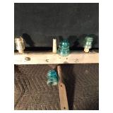 Glass insulators mounted on board - insulators screw off Glass insulators mounted on board - insulators screw off