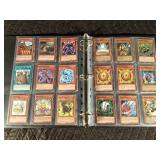 Binder of 97 Yu-Gi-Oh trading cards Binder of 97 Yu-Gi-Oh trading cards