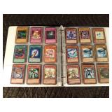 Binder of 97 Yu-Gi-Oh trading cards Binder of 97 Yu-Gi-Oh trading cards
