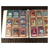 Binder of 97 Yu-Gi-Oh trading cards Binder of 97 Yu-Gi-Oh trading cards