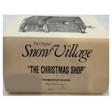 Department 56 Snow Village The Christmas Shop Handpainted Ceramic Lighted Building with Bench
