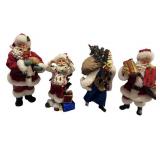 Set of 4 Santa Claus Christmas Figurines with Gifts and Holiday Details