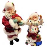 Set of 4 Santa Claus Christmas Figurines with Gifts and Holiday Details