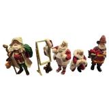 Set of 4 Clothtique Santa Figurines with Accessories