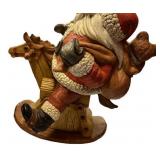 Santa Claus Figurine on Rocking Horse with Toys