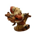 Santa Claus Figurine on Rocking Horse with Toys